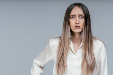 Fototapeta premium portrait of disgruntled pissed off angry grumpy pessimistic woman with bad attitude. Negative human emotion facial expression feeling