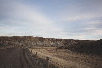 Coulees in southern alberta prairie road into valley