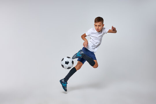 Boy Playing Soccer, Happy Child, Young Male Teenager Enjoying Sports Game, Isolated Portrait, Kids Activities, Little Soccer Player