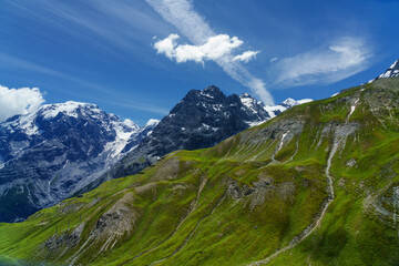 Mountain landscape along the road to Stelvio pass at summer. Glacier