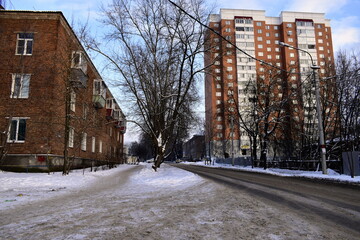 Fototapeta na wymiar dirty snow on a city street