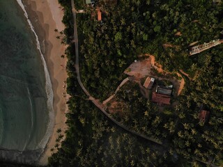 drone shot coastline beaches and houses Sri Lanka