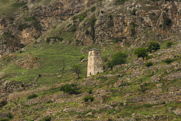 Fototapeta na wymiar mountain tower on a hill