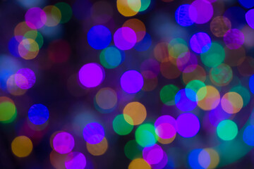 Beautiful festive multi-colored blurred background in balls.