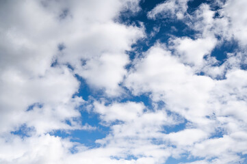 Blue Sky and Cloud Background. Bright blue sky full of clouds.