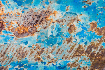 Old dirty metal rusty abstract pattern blue peeling paint wall texture background