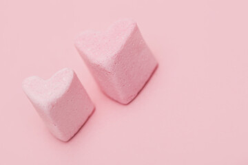 two little Sweet hearts on a pink background. Happy Valentines