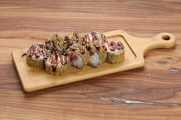 sushi on a wooden board