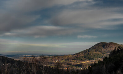 Winter sunrise near frosty Lysa hill in Beskydy mountains in blue sky morning