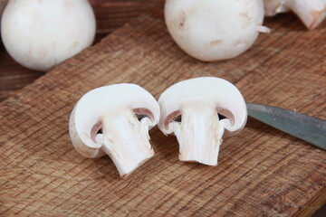 fresh champignons close-up on a wooden table Vegetarian food. Proper nutrition