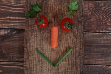 fresh spring vegetables close-up on a wooden table. 