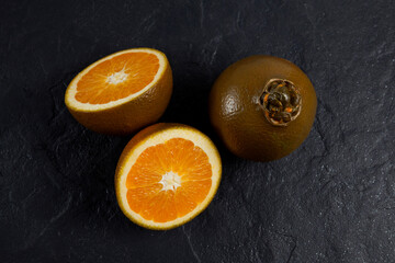 Navel Chocolate oranges - new variety of oranges. Uniquely colored fruits can be found in European markets during winter months
