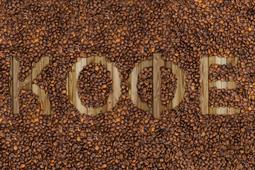 coffee lettering with grains seed beans in different languages russian