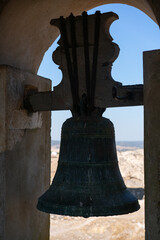 Fototapeta premium View of Juromenha castle window and bell in Alentejo landscape in Portugal