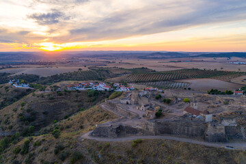 Juromenha castle, village and Guadiana river drone aerial view at sunset in Alentejo, Portugal