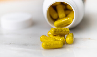Close up of Berberine Capsules Used to Maintain Insulin Levels Naturally