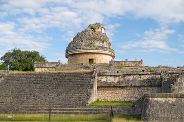 Fototapeta na wymiar Ruins of antique city. Observatory El Caracol in Chichen Itza. Mexico.