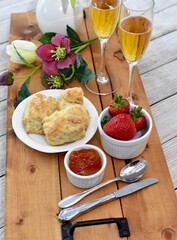Celebratory Mother's Day brunch for breakfast in bed to honour Mom with gourmet scones and preserves and champagne. 