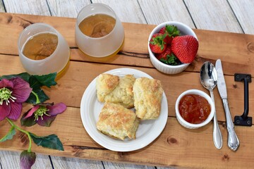 Celebratory Mother's Day brunch for breakfast in bed to honour Mom with gourmet scones and preserves and champagne. 