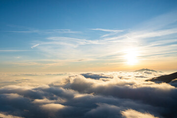 Fototapeta na wymiar clouds in the sky during a beautiful winter sunset. Sea of clouds, cloudscape