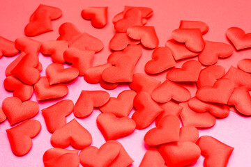 Many romantic red hearts scattered on a date day.