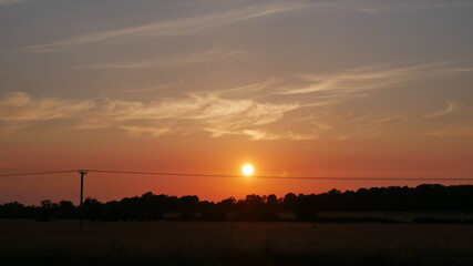 Beautiful sunset sky over the clouds