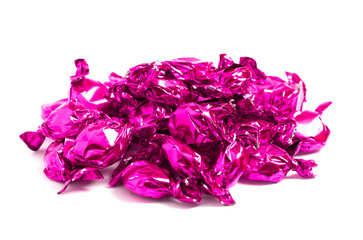 Pile of Pink Wrapped Candy Isolated on a White Background