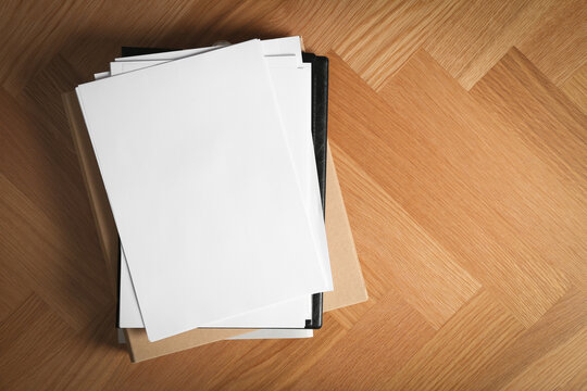 Stack Of Blank Paper On Wooden Background, Top View. Space For Text