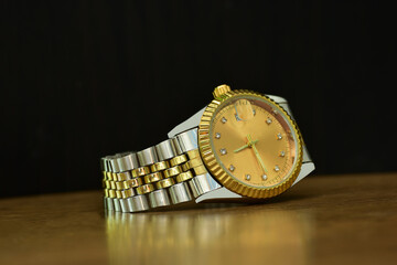 Gold watch with gold dial