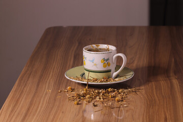 cup of coffee on wooden table