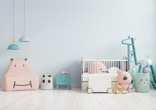 Mock up wall in the children's room with pink sofa in light blue color wall background.