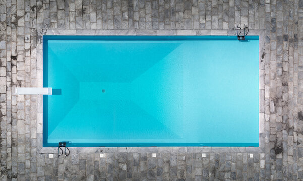 Aerial view of a beautiful swimming pool in Monticello, Lombardy, Italy.