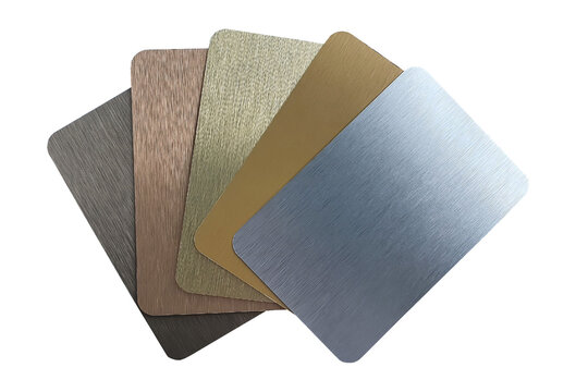 brushed metallic laminated samples swatch containing  silver ,gold ,rose gold ,nigel and copper texture. set of multi color and texture of aluminum or stainless samples isolated on white background.