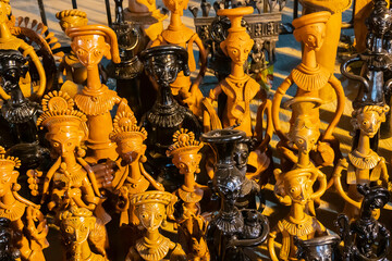 Long neck Terracotta tribal dolls, made in Krishnanagar, Nadia, West Bengal, for sale in Handicraft Fair in Kolkata.