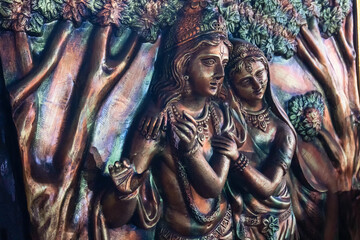 Lord Krishna posing as playing flute and Radha smiling, Goddess Durga with Son Ganesh, decorative...