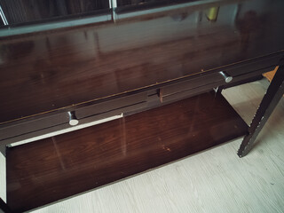 Laminated modern console table. In bad condition.