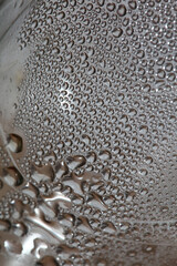 Water drops in transparent bottle close up modern background high quality prints