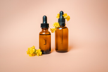 Dark bottles of facial oil for massage. Spa beauty salon for face and body care. Essence with anti aging effect