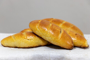 Traditional Russian pastry. Russian pirozhki, homemade baked patties.