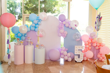 photo zone for a children's party with a candy bar. decor for a birthday.