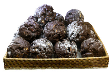 Dark chocolate balls on tray isolated on white