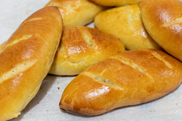 Freshly baked pies. Russian pies - piroshki with potatoes. Pirozhki. Food background