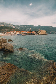Budva Old Town across body of water in Montenegro