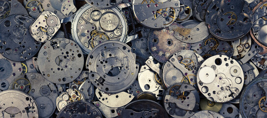 Details of an old mechanical watch close-up. Selective focus on details. Grunge background of vintage clock elements