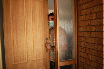 a person isolated for coronavirus at home