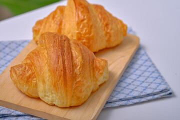 Warm Fresh Buttery Croissants and Rolls. French and American Croissants and Baked Pastries are enjoyed.
