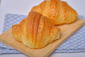Warm Fresh Buttery Croissants and Rolls. French and American Croissants and Baked Pastries are enjoyed.