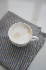 White coffee mug with milk foam