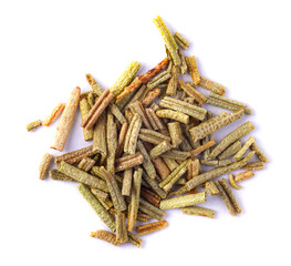 Pile of dried rosemary leaves isolated on white background. Macro photo