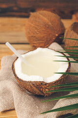 Fresh coconuts on wooden background